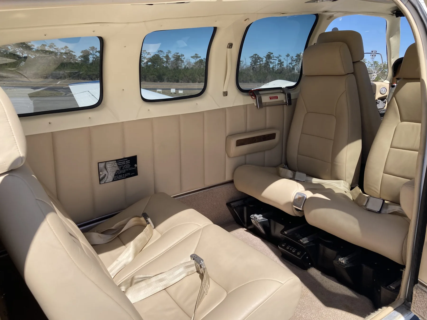 Six-seat cream leather cabin in N584ME